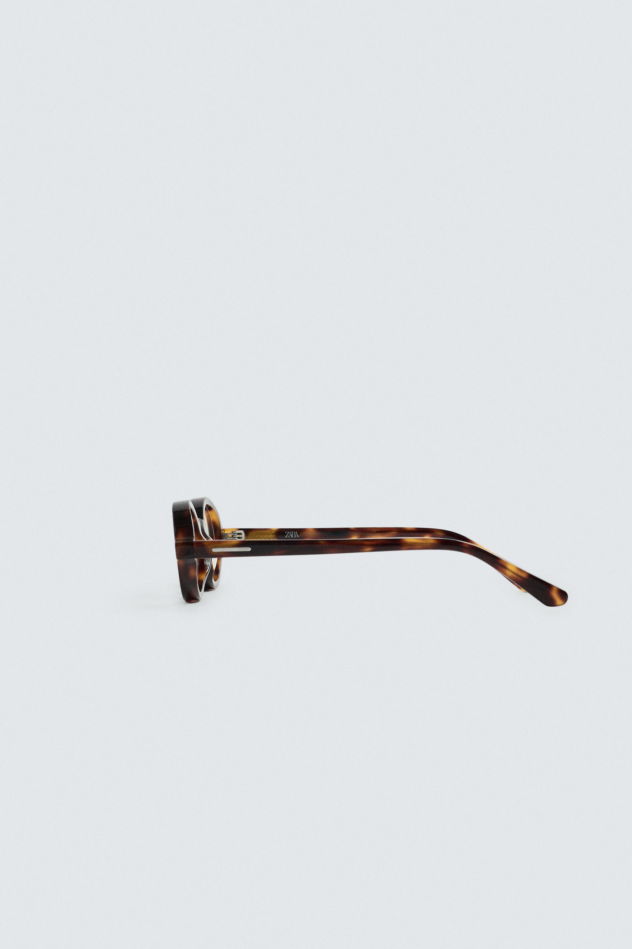 TORTOISESHELL EFFECT OVAL SUNGLASSES
